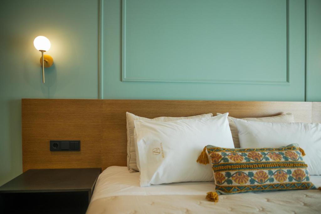 Posteľ alebo postele v izbe v ubytovaní Aggelos Hotel