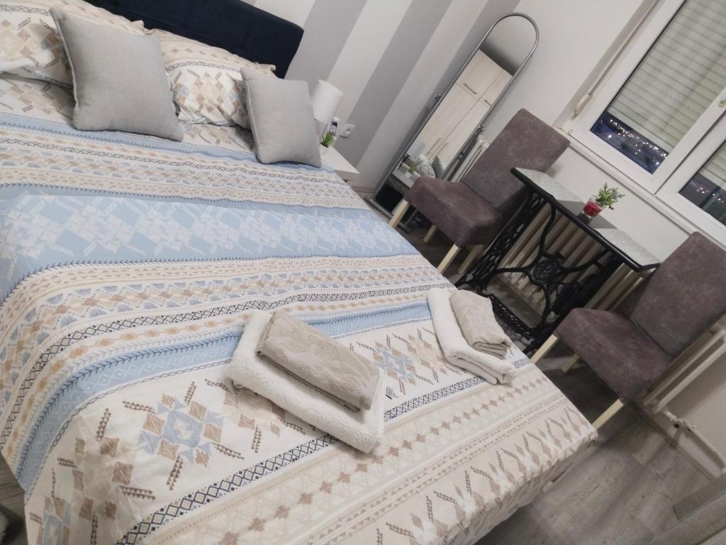 Postel nebo postele na pokoji v ubytování Studio apartman Nataly