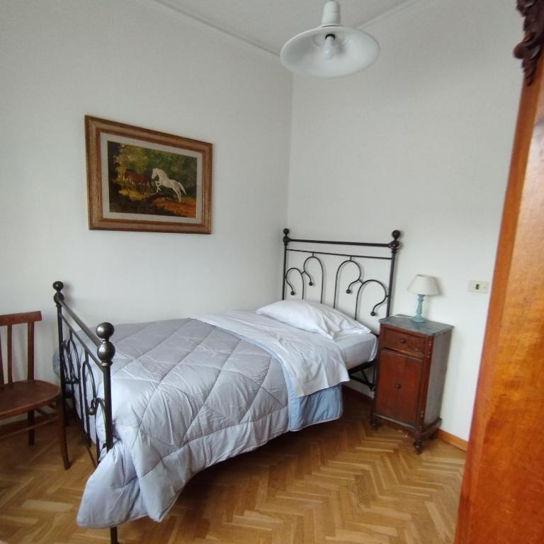 Postel nebo postele na pokoji v ubytování Casa Ugo