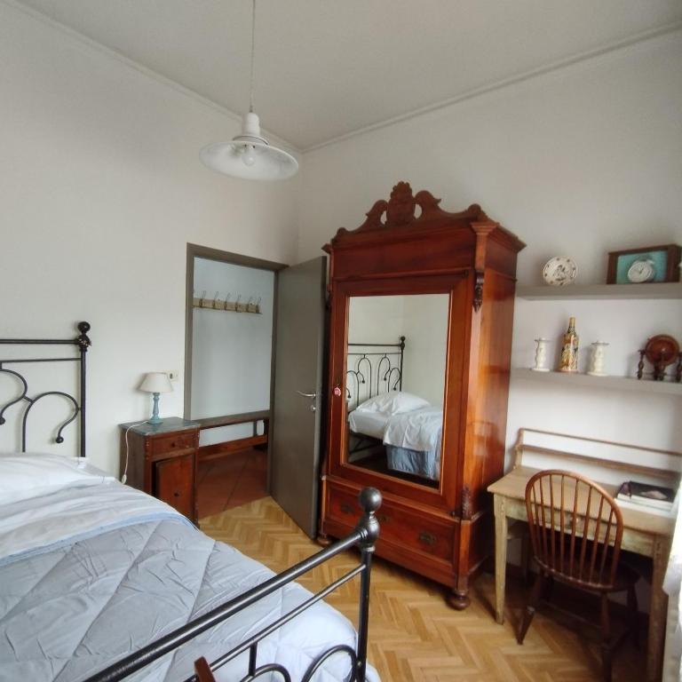 Postel nebo postele na pokoji v ubytování Casa Ugo