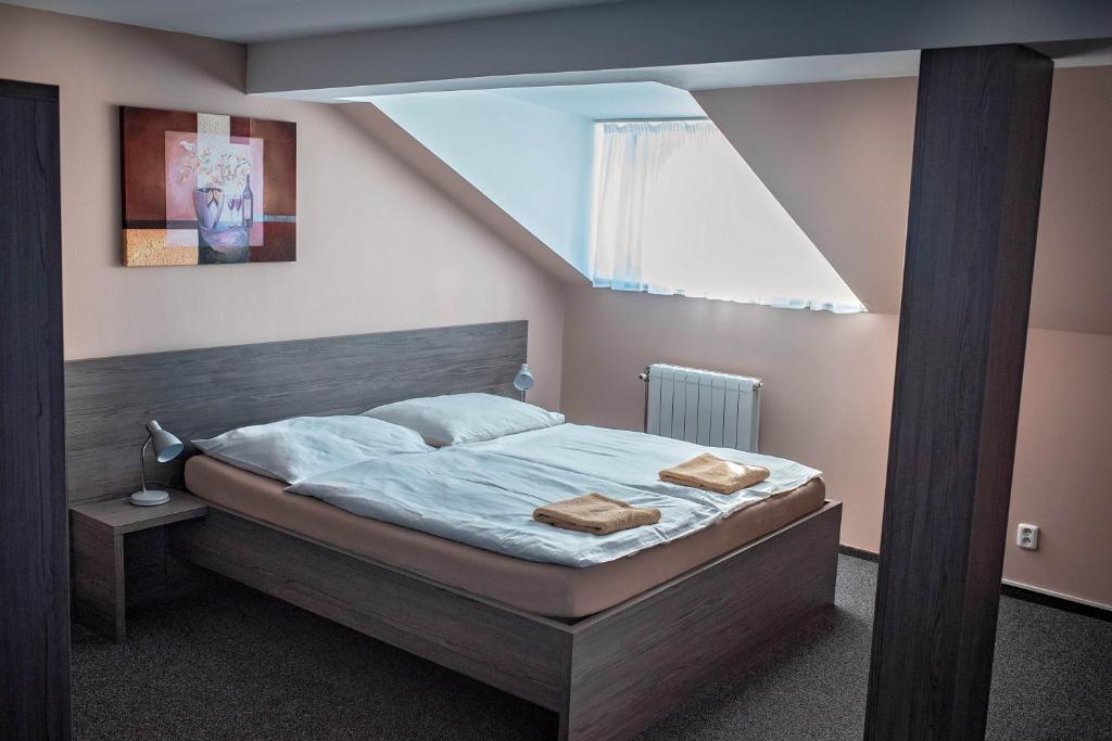Ein Bett oder Betten in einem Zimmer der Unterkunft Almond
