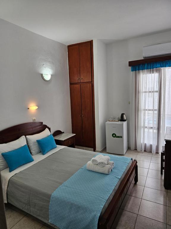 Ein Bett oder Betten in einem Zimmer der Unterkunft Hotel Leta