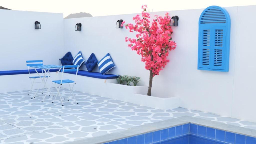 Bazén v ubytování Palms Residence Inn دار النخيل nebo v jeho okolí
