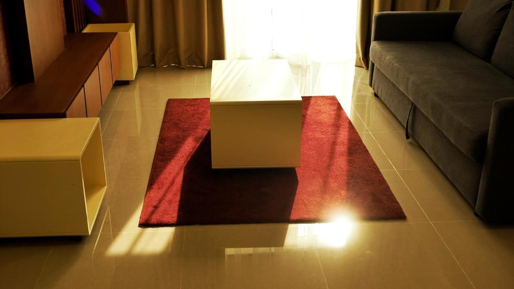 Posezení v ubytování Palms Residence Inn دار النخيل