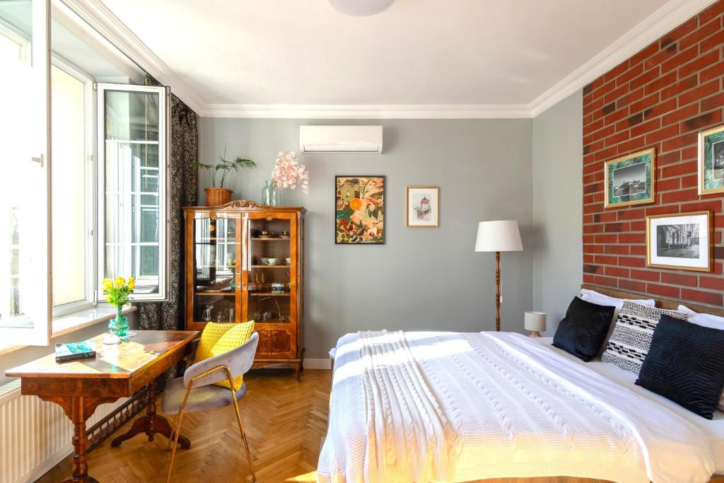 Posteľ alebo postele v izbe v ubytovaní Smile Apartments Center Kraków Old Town