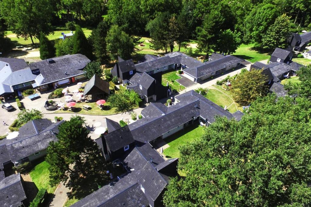 an aerial view of a house with roofs at Holiday resort Normandie Forges les Eaux Apartment for 5 pers in Forges-les-Eaux