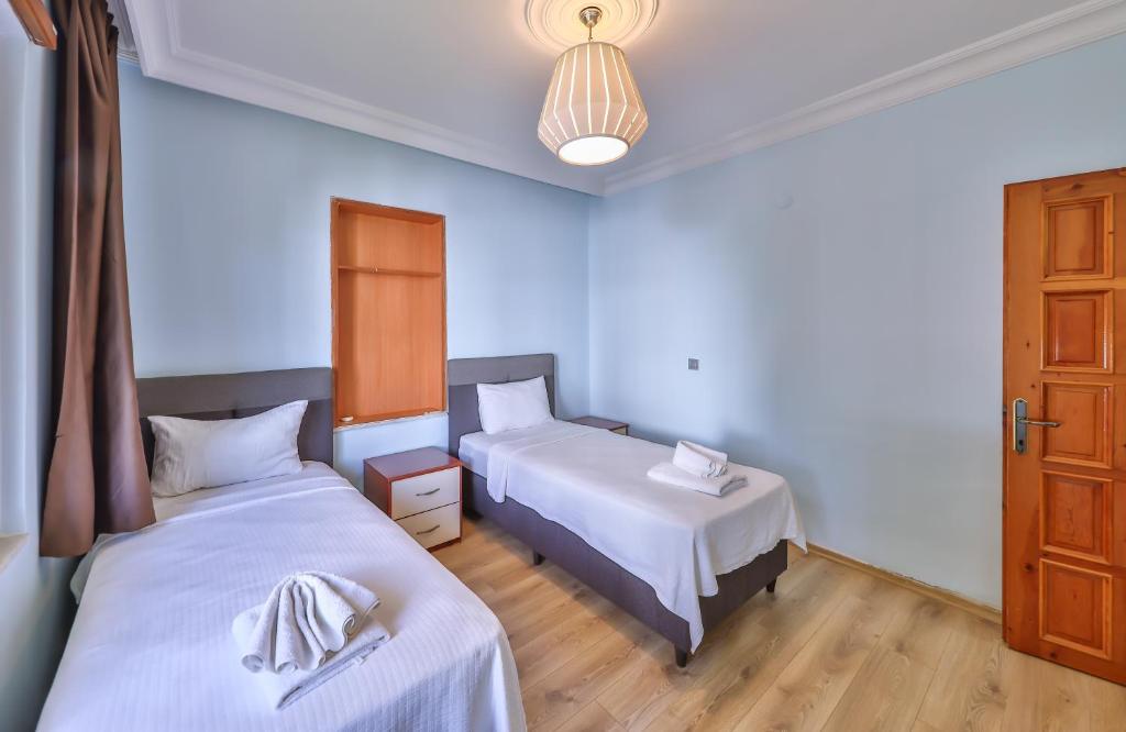 Postel nebo postele na pokoji v ubytování Villa Dundar - Kas Apartments
