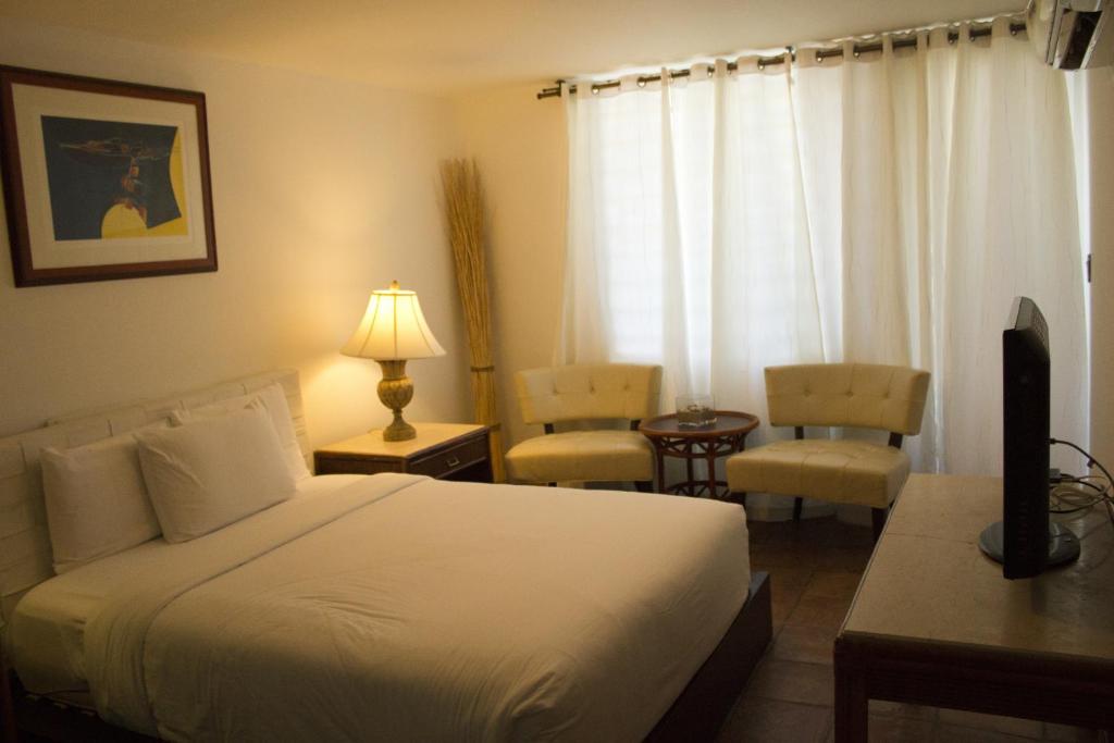 Postel nebo postele na pokoji v ubytování Hosteria del Mar