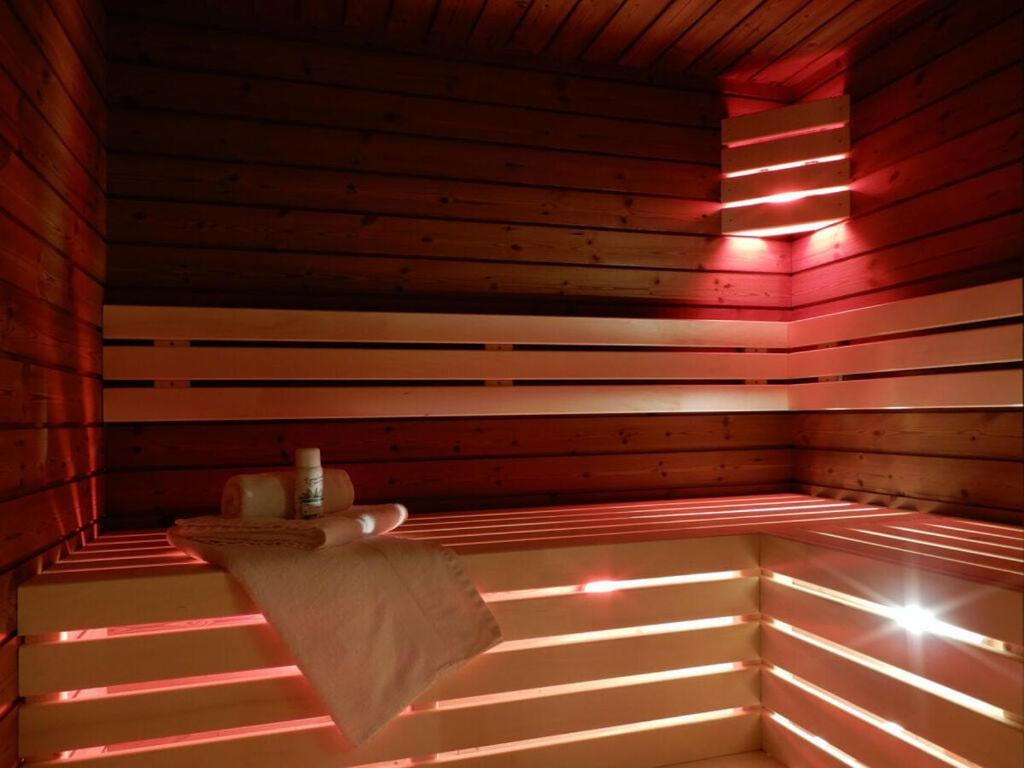 a room with a sauna with a towel in it at Fantastic apartment in Zierow in Zierow