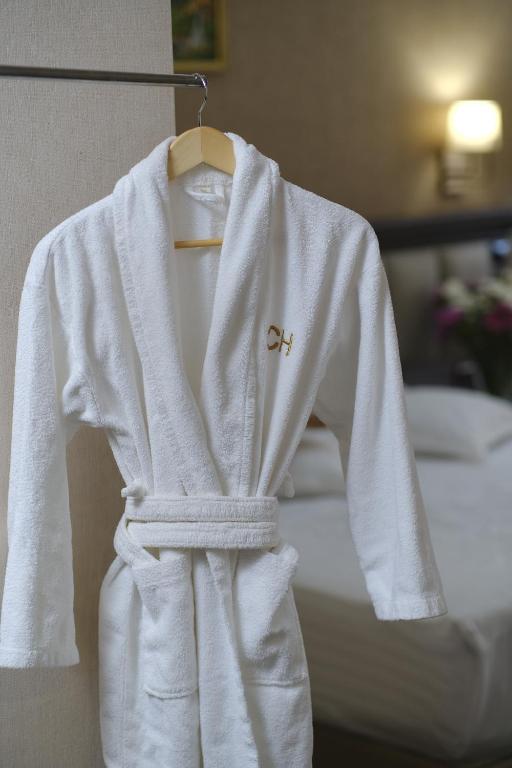 Postel nebo postele na pokoji v ubytování Konyak Hotel
