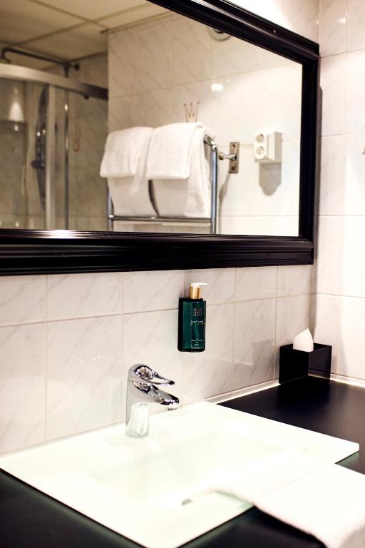 Koupelna v ubytování Home Hotel Smedjan
