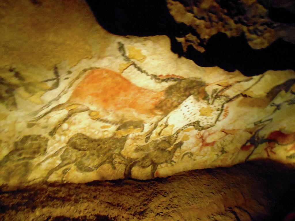 a painting of a horse on the side of a cave at Snug cottage in Saint Eutrope De Born with pool in Saint-Eutrope-de-Born