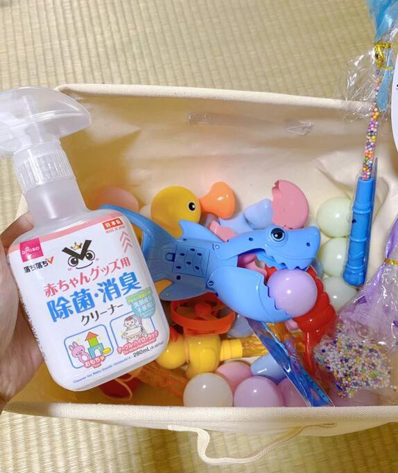 a container filled with toys and a bottle of detergent at Pokémon Sleep 宝可梦的家 in Osaka