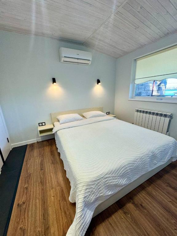 Postel nebo postele na pokoji v ubytování Shtil