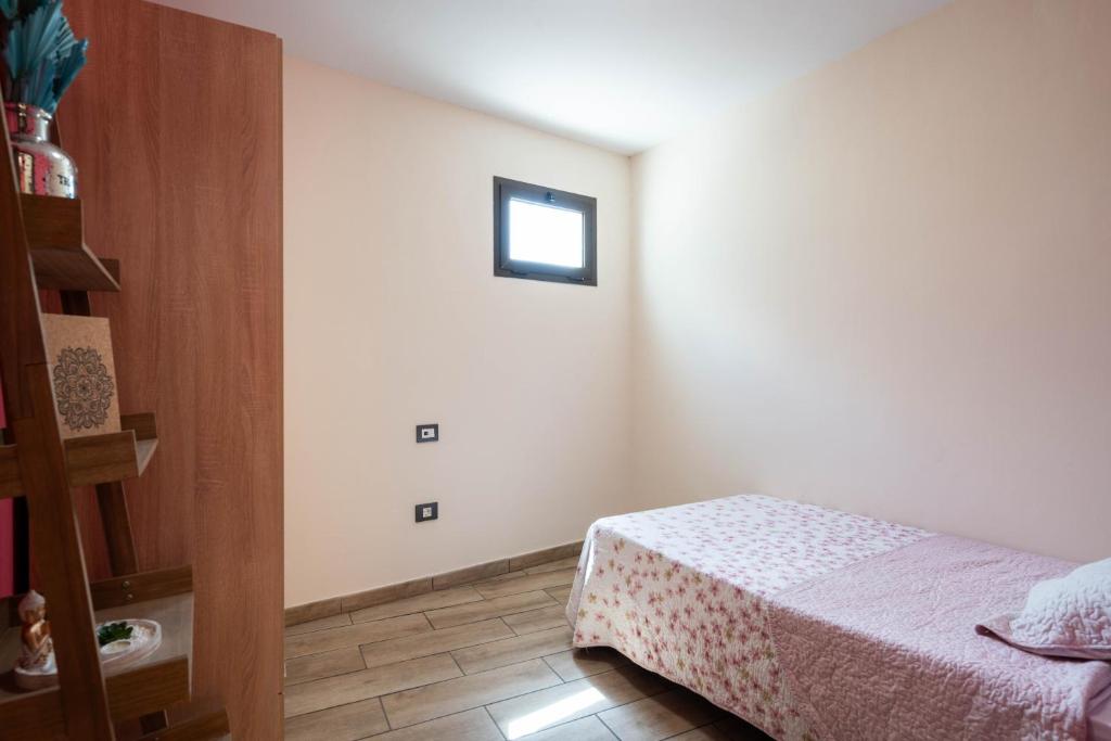 Postel nebo postele na pokoji v ubytování Las Fajanas de Gáldar
