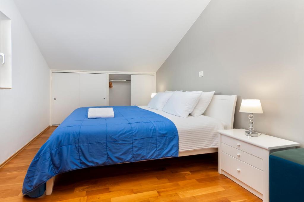 Postel nebo postele na pokoji v ubytování Apartment Lili