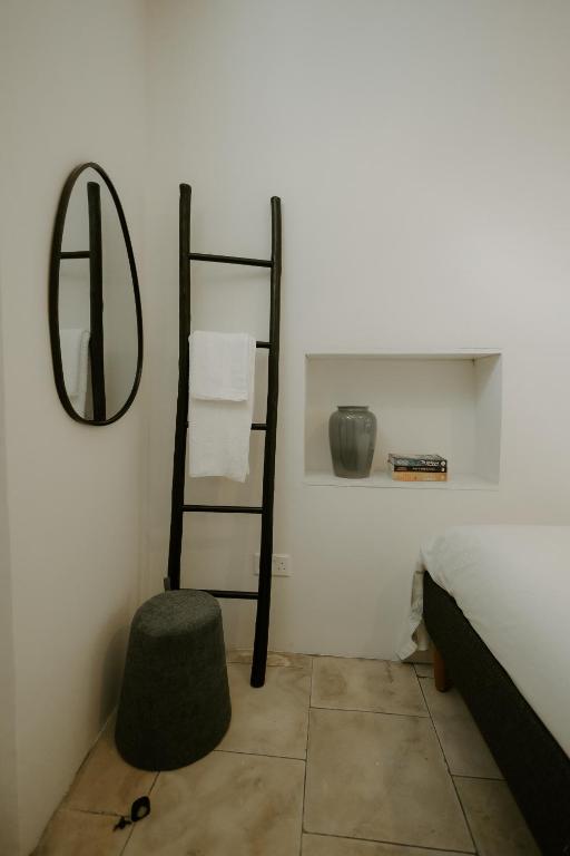 Postel nebo postele na pokoji v ubytování Smaragda's Guest Rooms