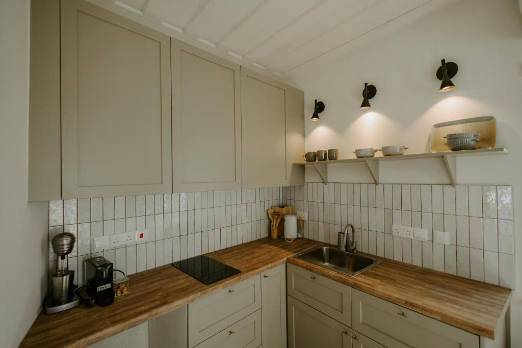 Kuchyň nebo kuchyňský kout v ubytování Smaragda's Guest Rooms