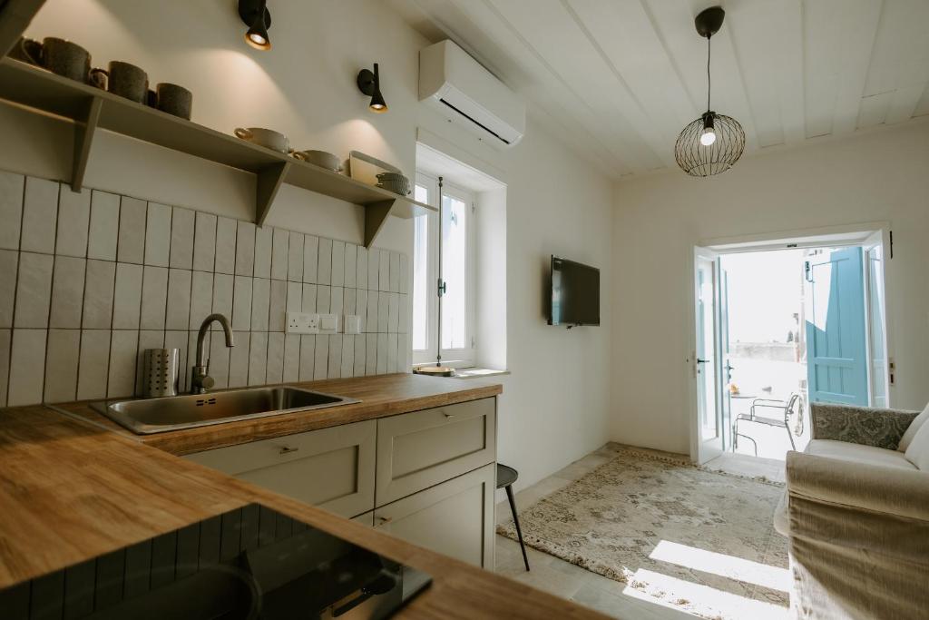 Kuchyň nebo kuchyňský kout v ubytování Smaragda's Guest Rooms