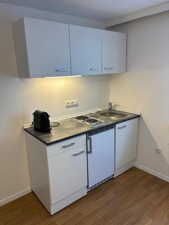 Kuchyň nebo kuchyňský kout v ubytování Zentrale Wohnung Gmunden Alte Bäckerei