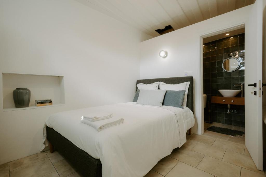 Postel nebo postele na pokoji v ubytování Smaragda's Guest Rooms