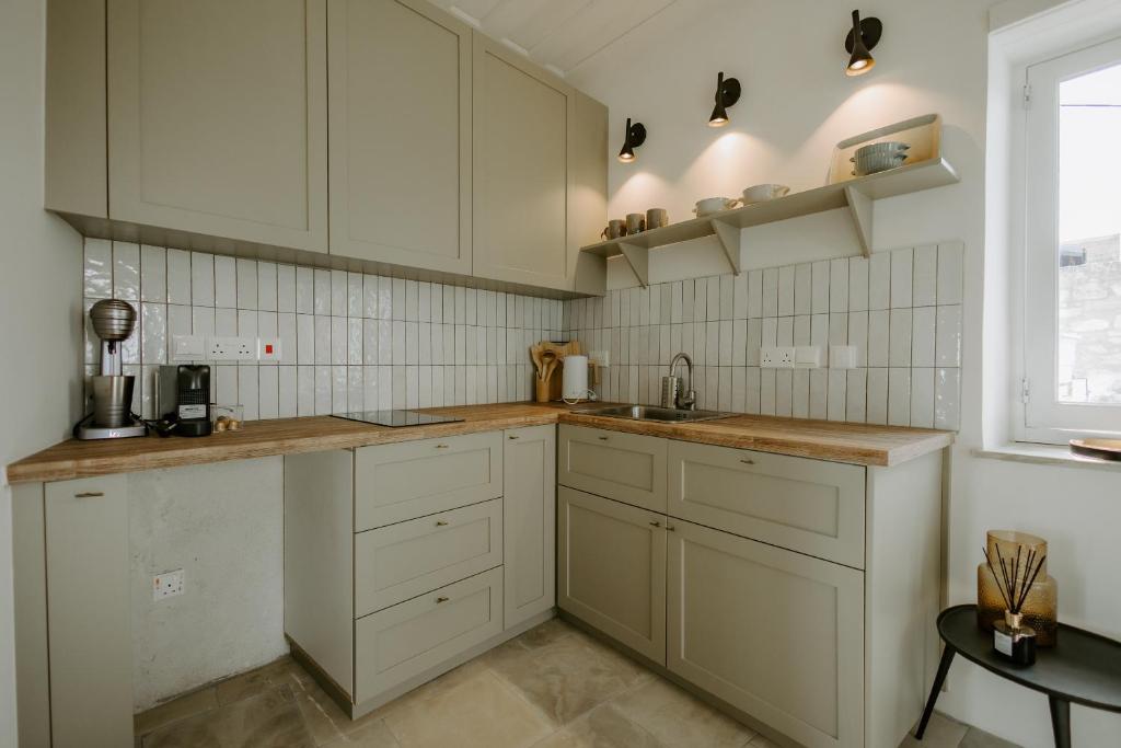 Kuchyň nebo kuchyňský kout v ubytování Smaragda's Guest Rooms