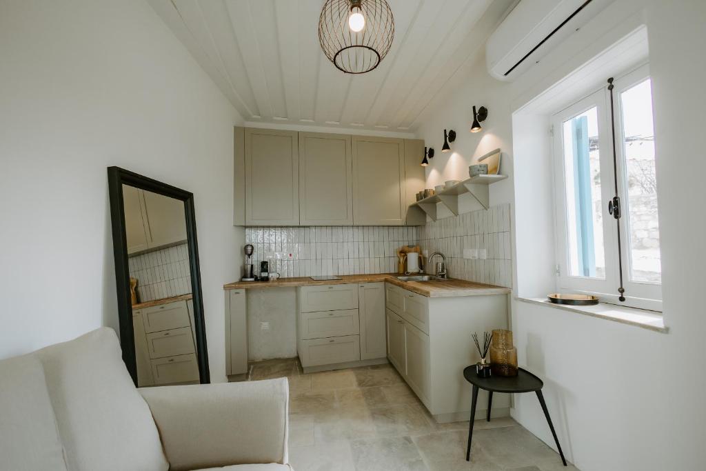 Kuchyň nebo kuchyňský kout v ubytování Smaragda's Guest Rooms