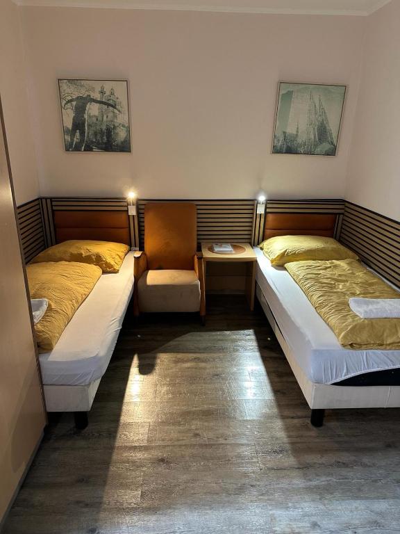 Ліжко або ліжка в номері Cesar's Apartment