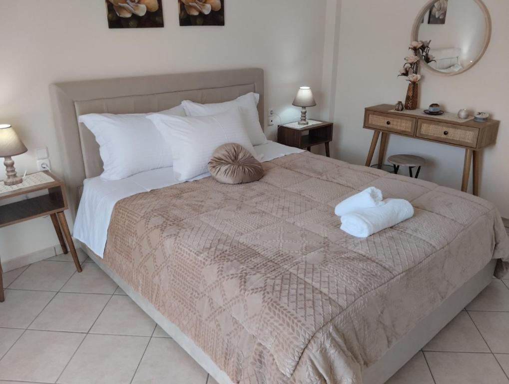 Postel nebo postele na pokoji v ubytování Lina's House Pramanta
