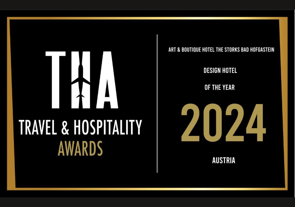 two posters with the words tka travel and hospitality awards at Hotel Bad Hofgastein - The STORKS - Adults Only in Bad Hofgastein