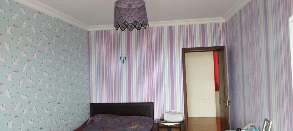 Postel nebo postele na pokoji v ubytování LT property