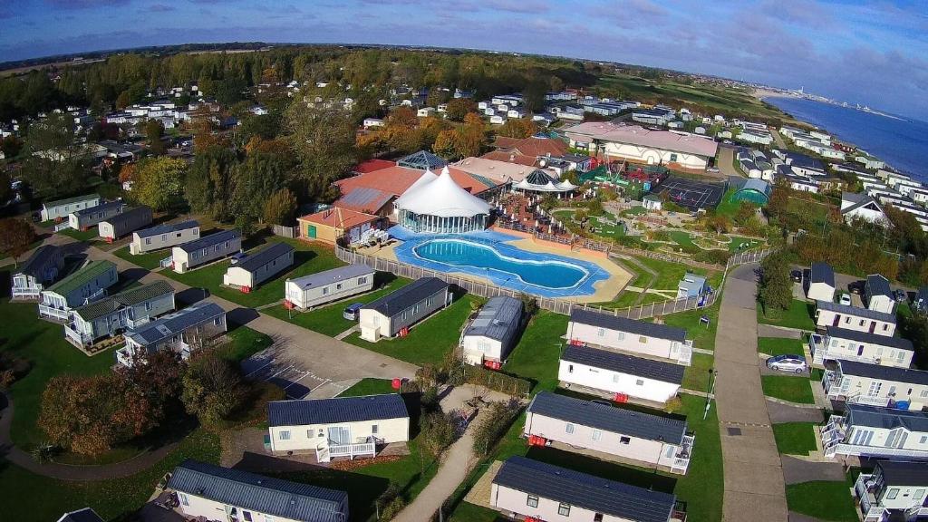 an aerial view of a resort with a swimming pool at 8 Berth Caravan At The Seaside Of Haven Hopton-on-sea In Norfolk Ref 80065f in Great Yarmouth