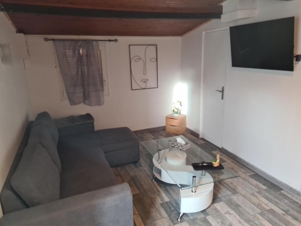Posezení v ubytování la chêneraie appart Lapin