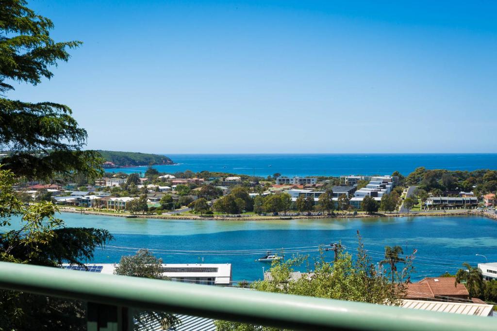 a view of a river from a balcony at Panoramic Townhouses by Lisa in Merimbula