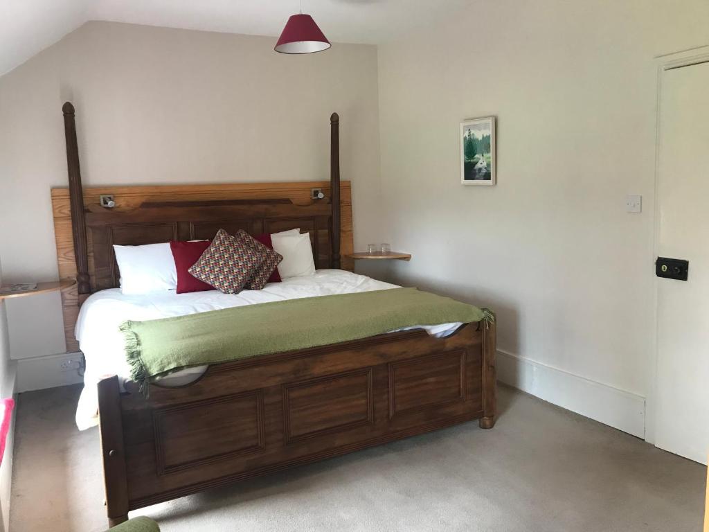 Postel nebo postele na pokoji v ubytování Gortamullen House, Kenmare