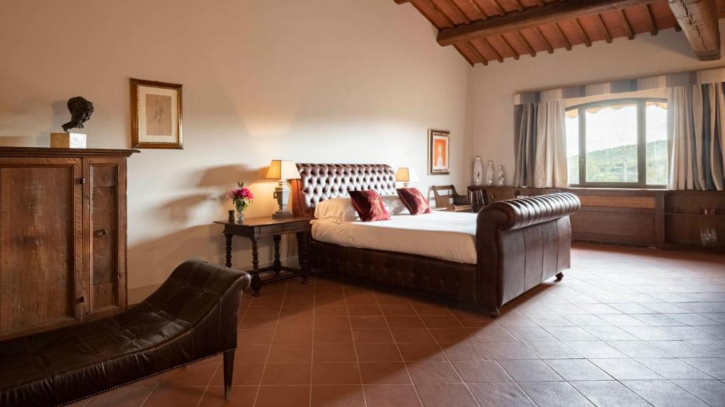 Postel nebo postele na pokoji v ubytování Villa La Selva Wine Resort