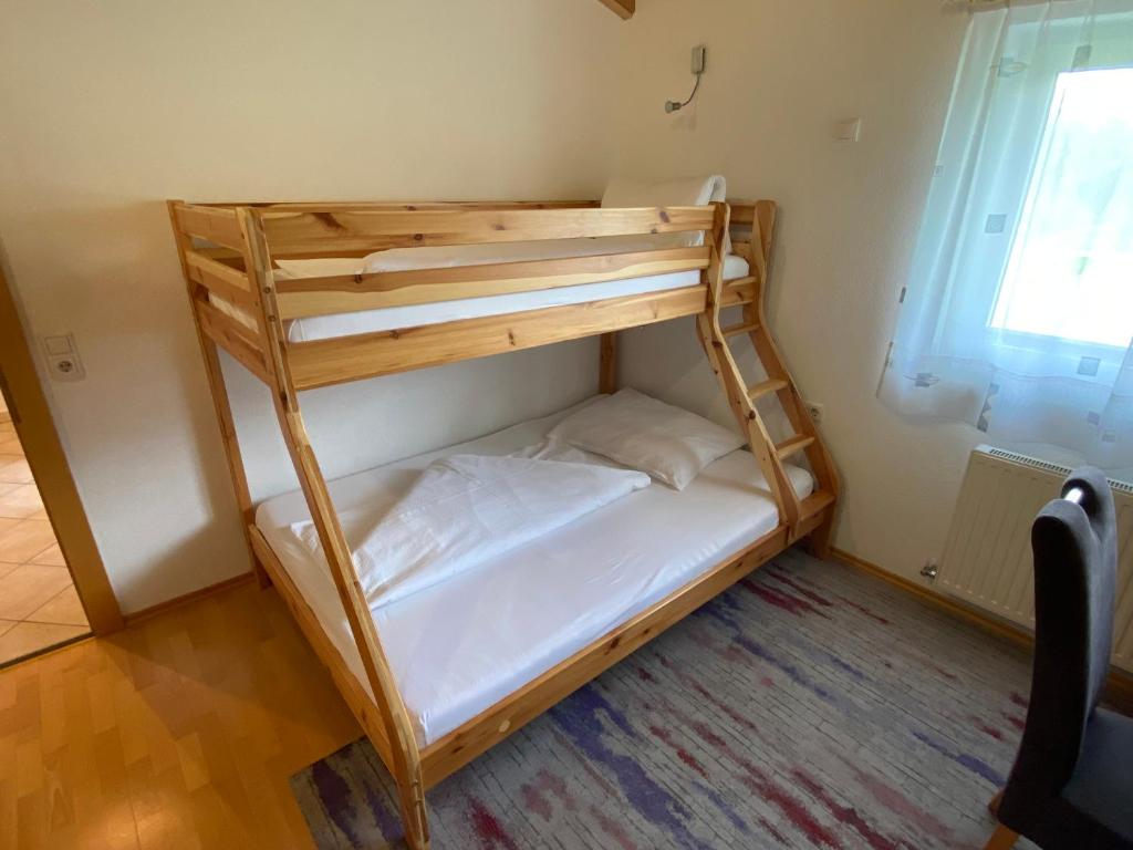 Postel nebo postele na pokoji v ubytování Ferienwohnung Mark-Oehmen