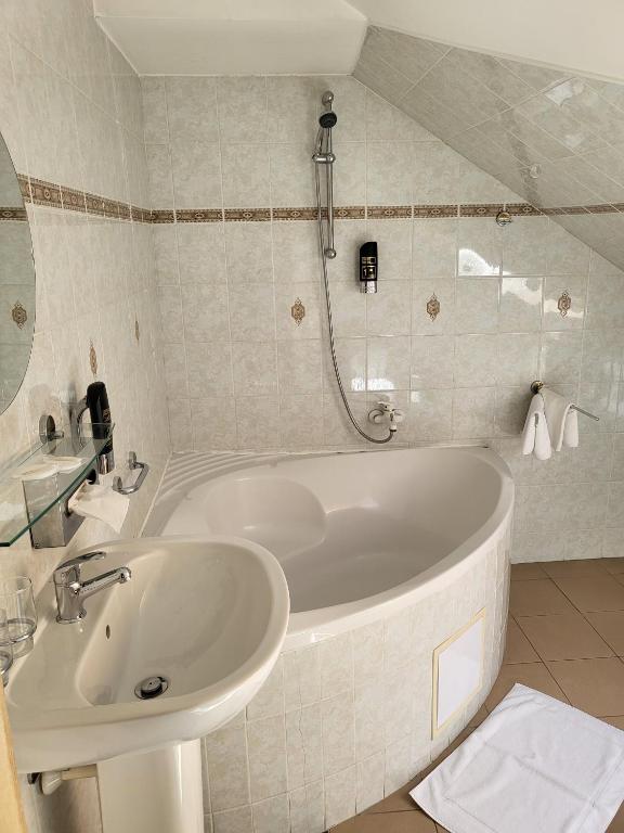 Koupelna v ubytování Hotel Margit