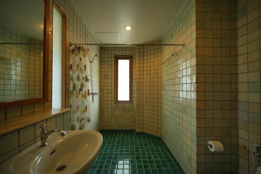Koupelna v ubytování Tanaosri Resort Pranburi
