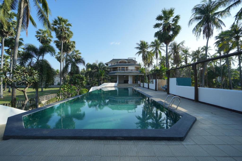 Bazén v ubytování Tanaosri Resort Pranburi nebo v jeho okolí