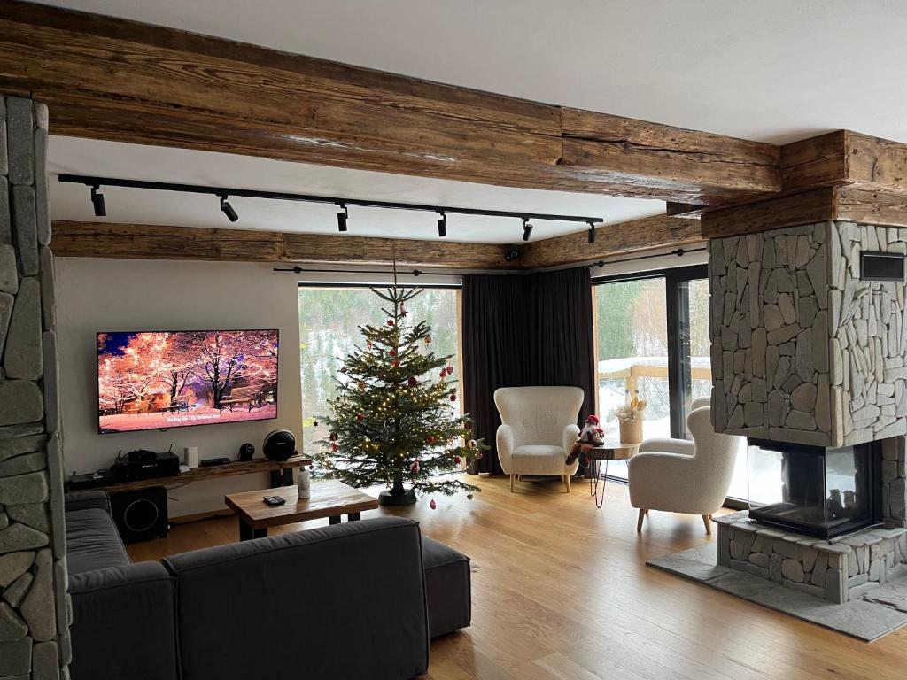 TV a/nebo společenská místnost v ubytování Poczuj Spokój Szczyrk - Free Sauna & Balia