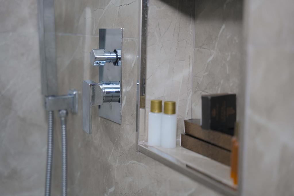 Koupelna v ubytování AFA Hotel