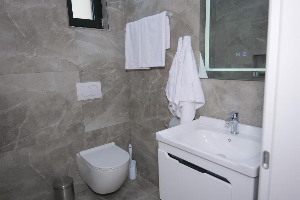Koupelna v ubytování AFA Hotel