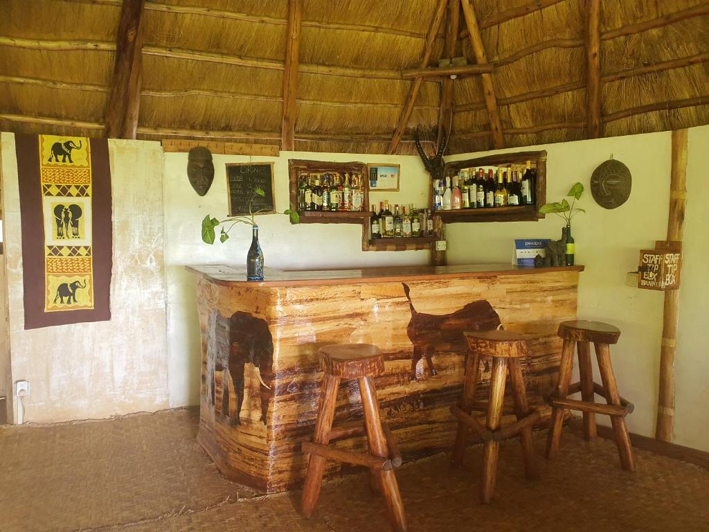Nápoje v ubytování Pumba Safari Cottages