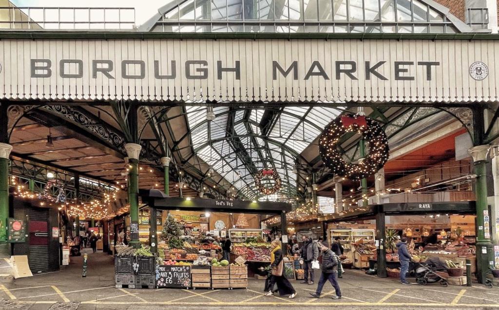 a grocery market with people walking through a shopping mall at Luxury Collection - 2 Bedroom Apartment -Borough Market in London