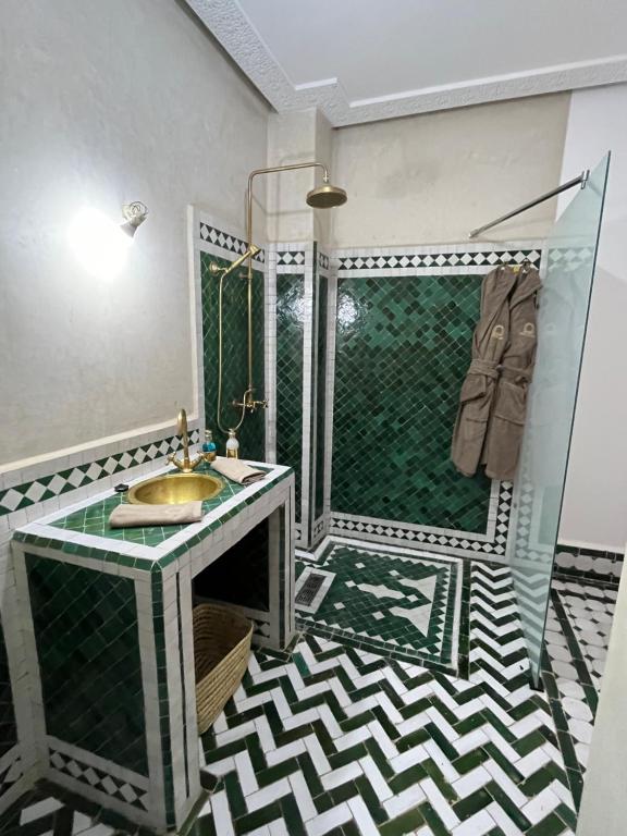Koupelna v ubytování RIAD KS & SPA