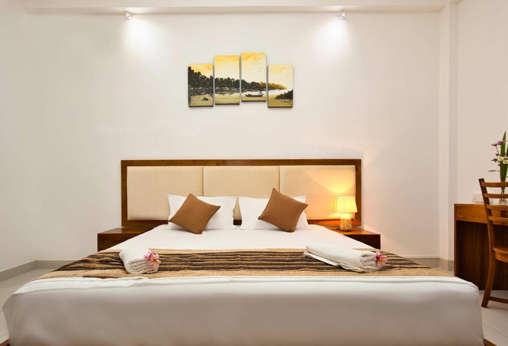 Postel nebo postele na pokoji v ubytování Amandara Hills Kandy