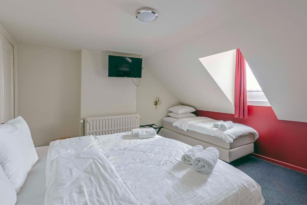 Postel nebo postele na pokoji v ubytování Hotel Rubenshof