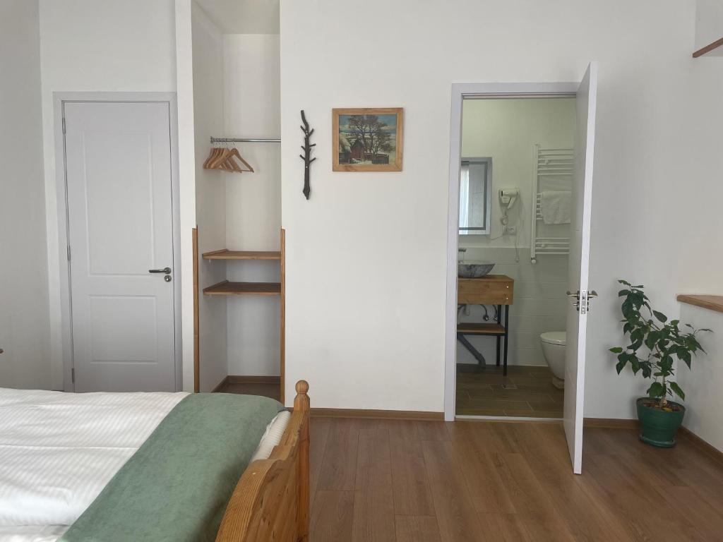 Postel nebo postele na pokoji v ubytování Friendly Home