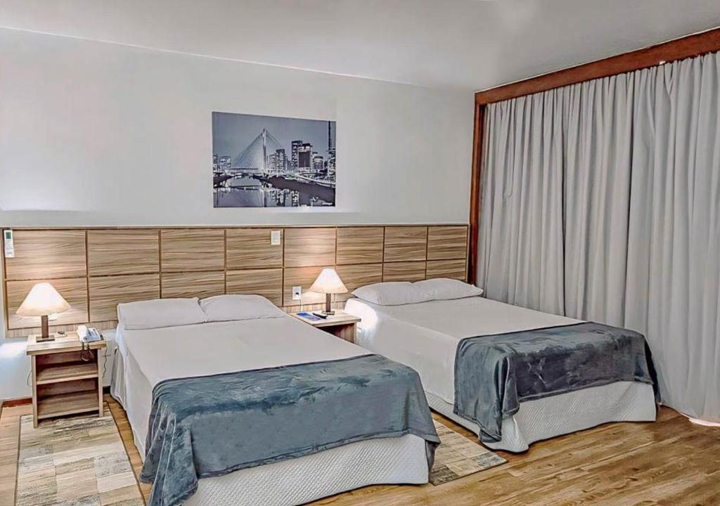 Cama ou camas em um quarto em Hotel Dan Inn Planalto São Paulo